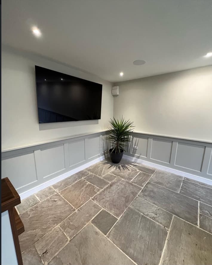 Panelled games room with pool table, roof lantern and bespoke bar area.