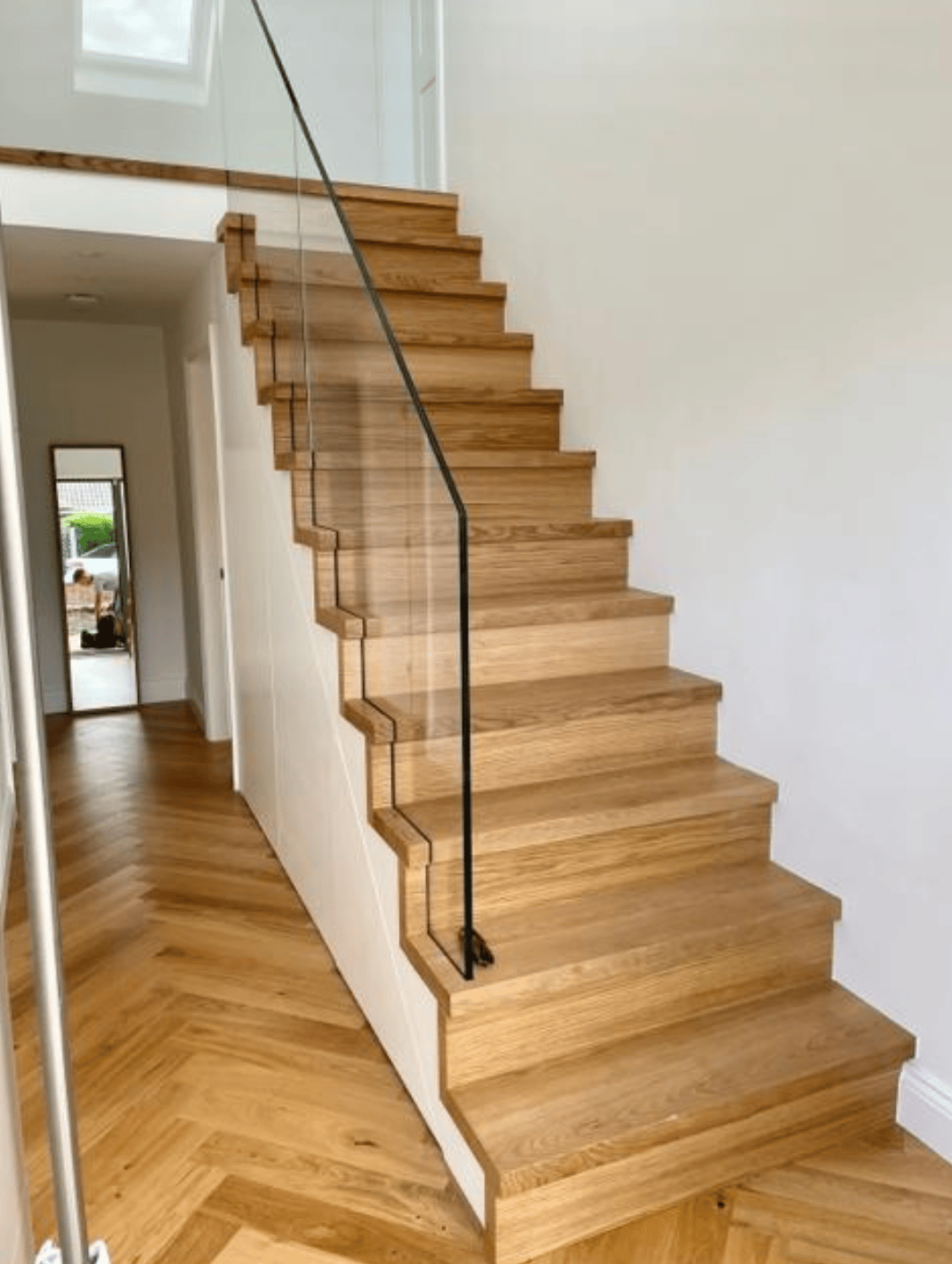 frameless glass staircase under stair wc project photograph 1.